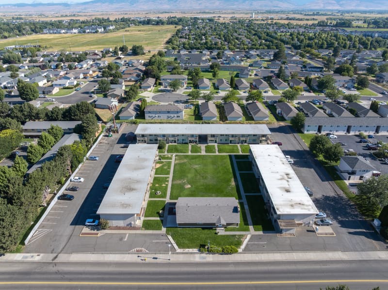 Aerial view of the Campus Village buildings around the central lawn