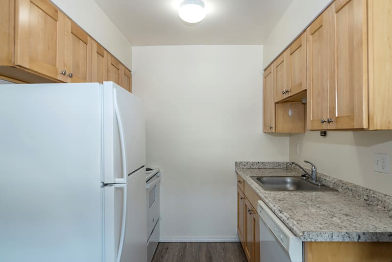 Galley kitchen in an apartment at Campus Village