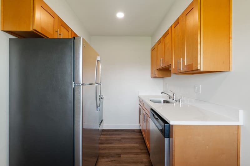 Fully renovated two bedroom apartment kitchen at Campus Village
